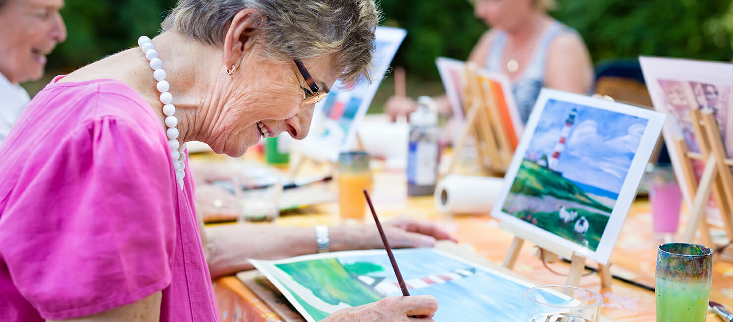 Elderly people painting